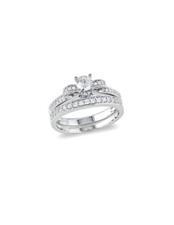 Podwójny pierścionek z białymi cyrkoniami Podwójny srebrny pierścionek z białymi cyrkoniami z dodatkową obrączką